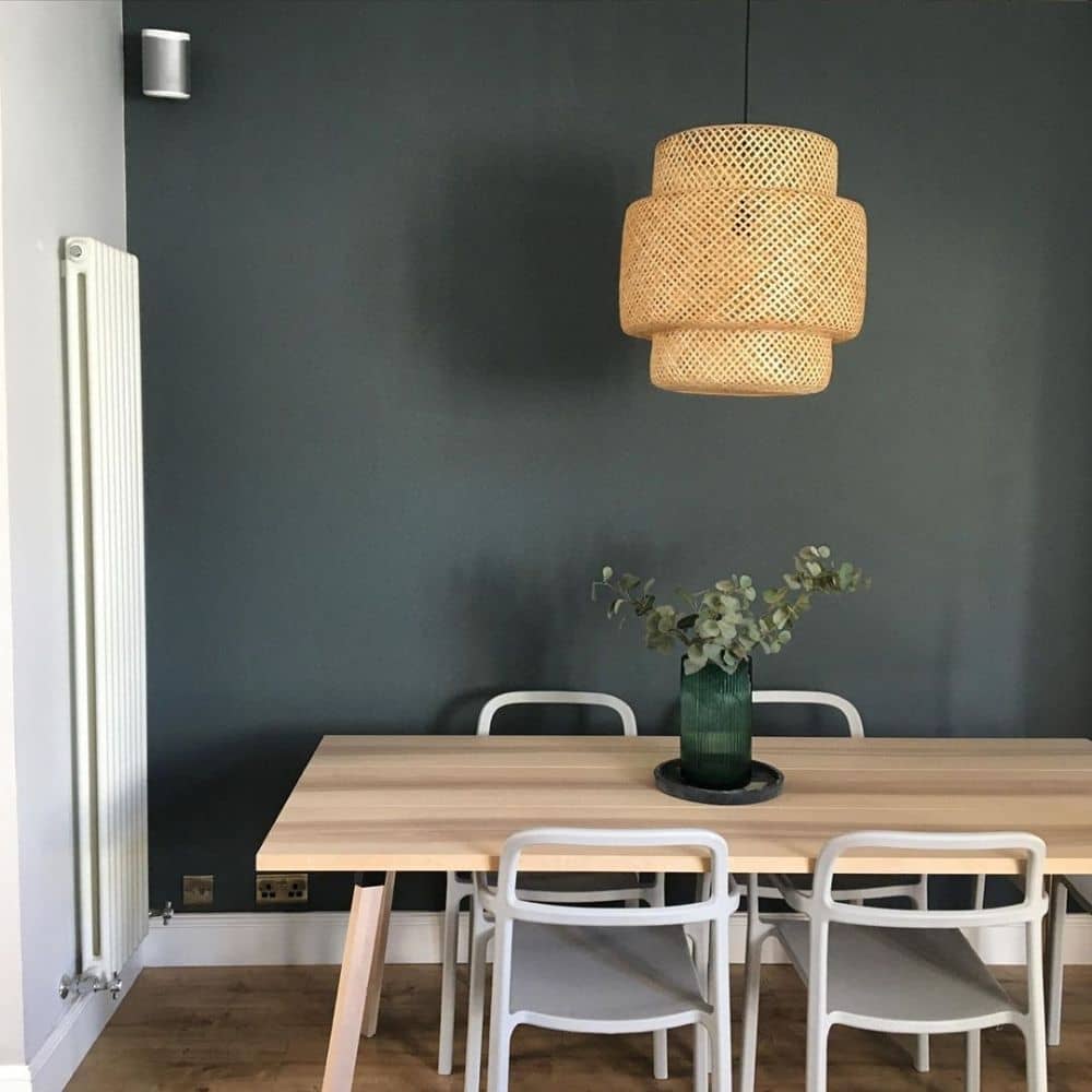 vertical column radiator in a scandi style dining room