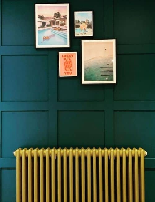 gold radiator on a green wall