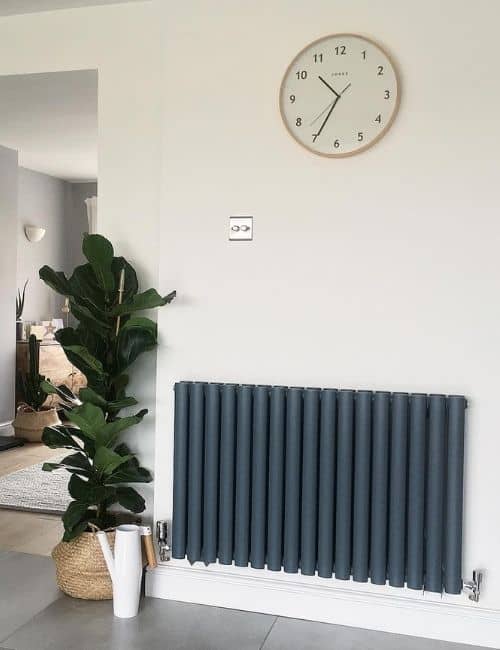 anthracite designer radiator on a white wall