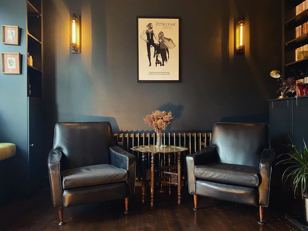 cast iron radiator on a black wall