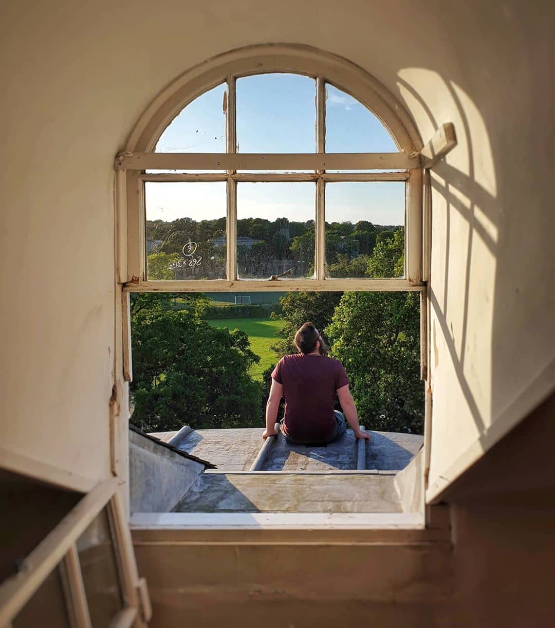 Greg looking onto the garden greg looking out the window