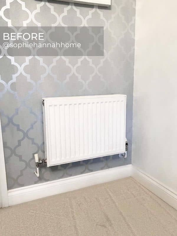 old white radiator on a silver wall