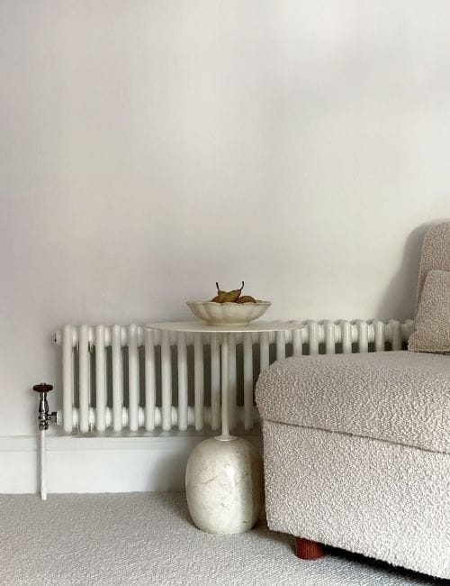 low level column radiator on a white wall