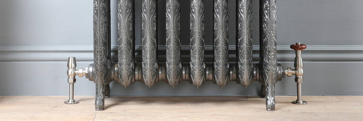 bottom view of cast iron radiator in silver