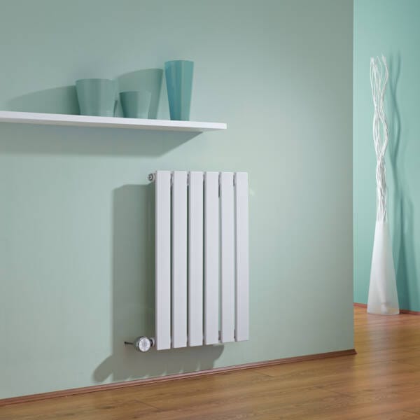 white electric radiator in green interior white electric radiator in green interior