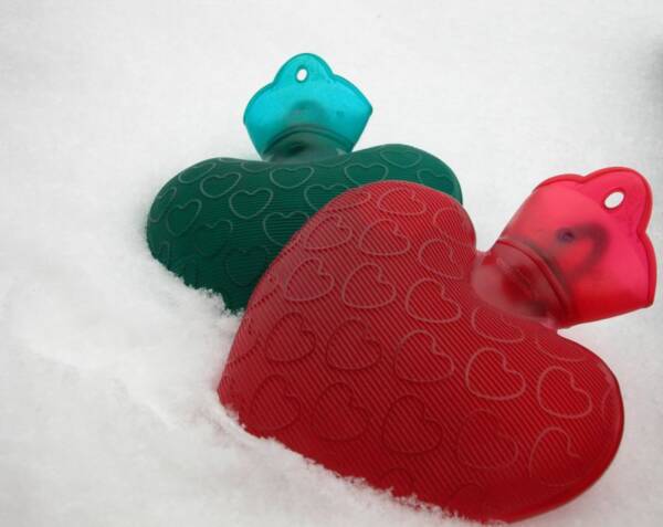 love heart patterns on green and red hot water bottles love heart patterns on green and red hot water bottles