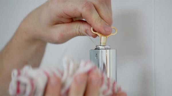 water spraying from the bleed valve of a heated towel rail