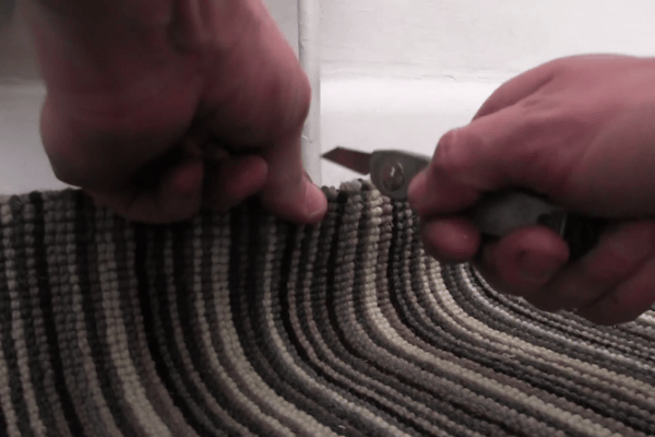 How to Install a Radiator_29_Cutting Carpet