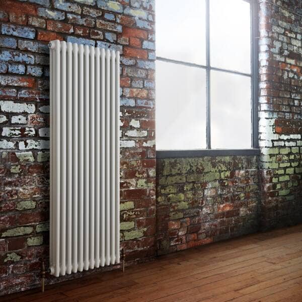 Milano Windsor Traditionally styled vertical radiator on an industrial style wall