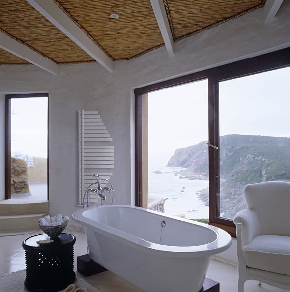 Lazzarini Way Spinakker heated towel rail in picturesque bathroom overlooking mountain Lazzarini Way Spinakker heated towel rail in picturesque bathroom overlooking mountain