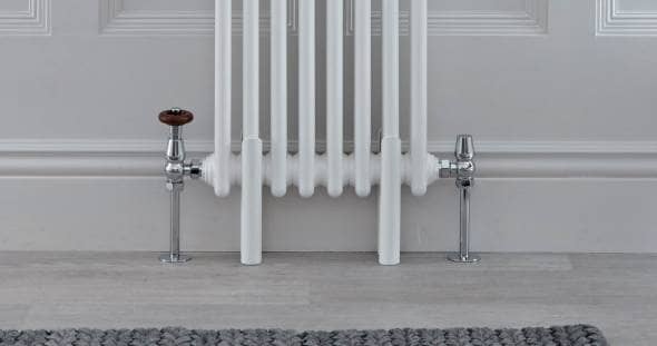 Radiator feet on a white traditional column radiator