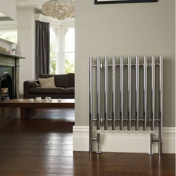 Stainless Steel radiator on a wall in a living room