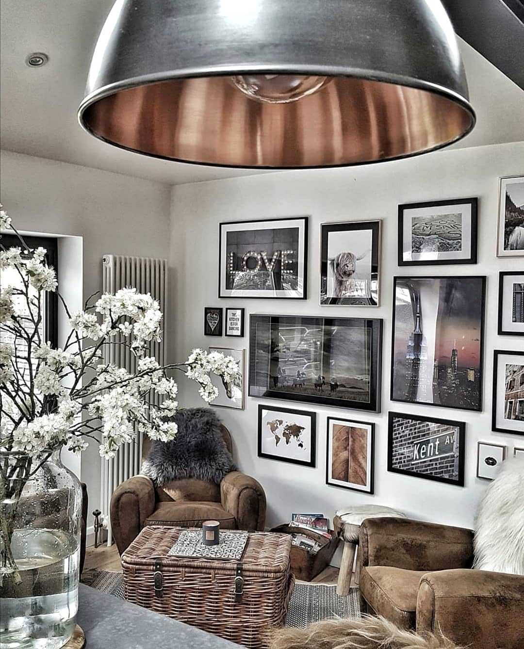 tall radiator next to a gallery wall