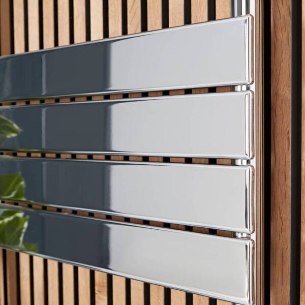 a clean chrome bathroom radiator