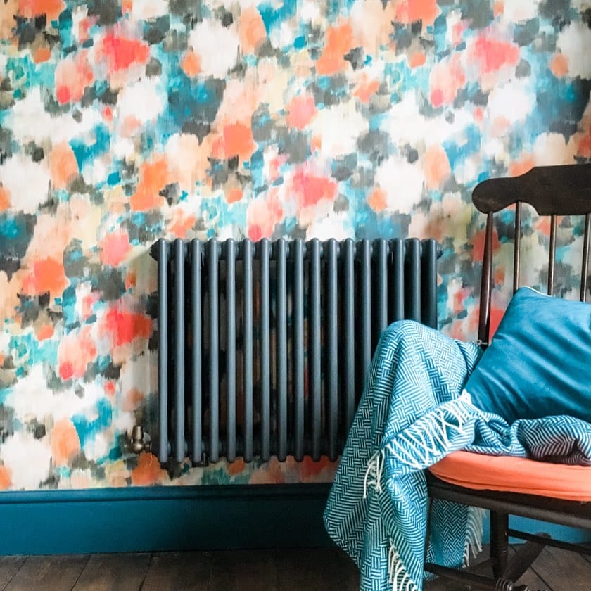 anthracite radiator on colourful wall