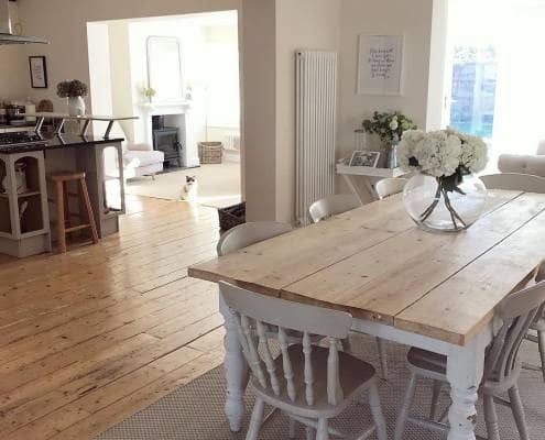 Country style dining room with a column radiator