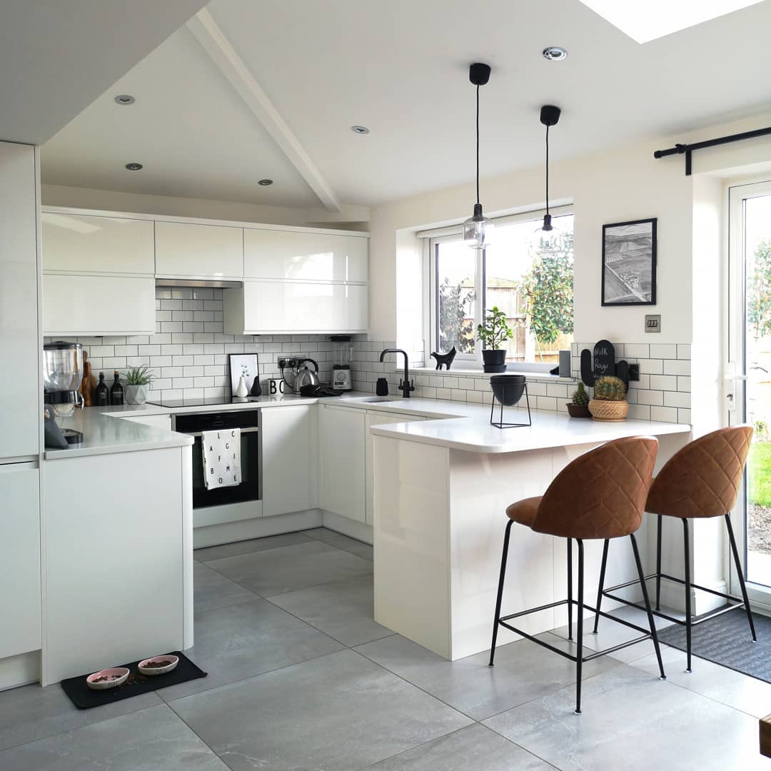 56398526_833716757007007_1797796273844766989_n modern white kitchen with two bar stools