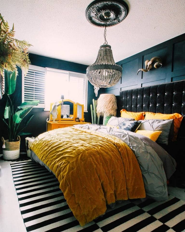 eclectic bedroom with yellow bedding