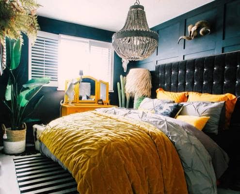 eclectic bedroom with yellow bedding