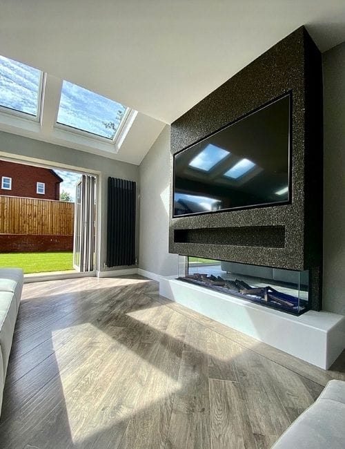 vertical anthracite radiator in a contemporary living room