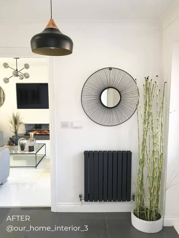 anthracite horizontal designer radiator in a hallway