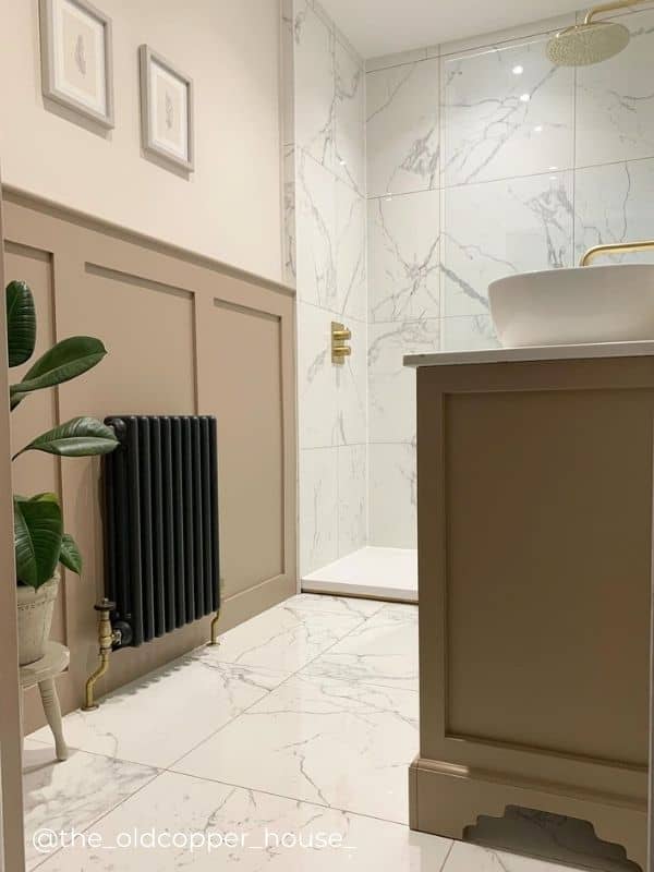 anthracite column radiator in a bathroom