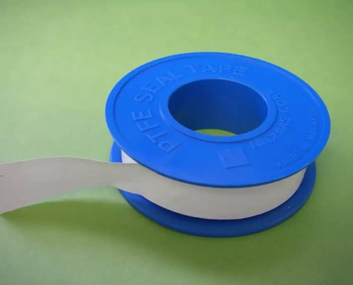 a blue roll of PTFE tape