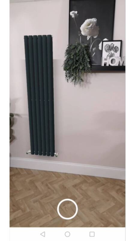 vertical anthracite milano aruba radiator in a living room