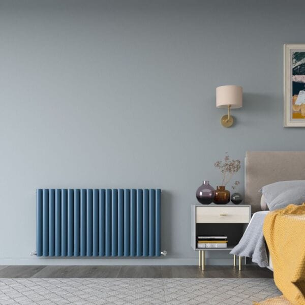 a blue radiator in a bedroom space