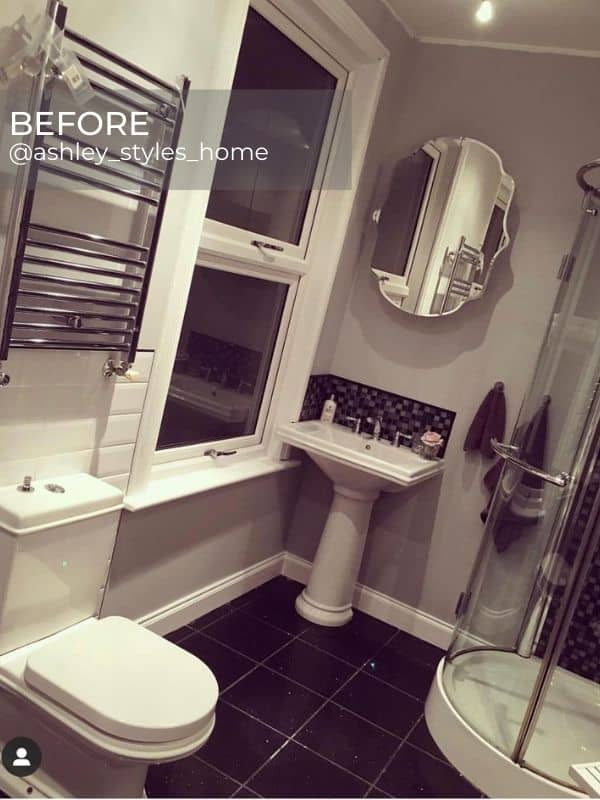 chrome towel rail in a silver bathroom before the renovation