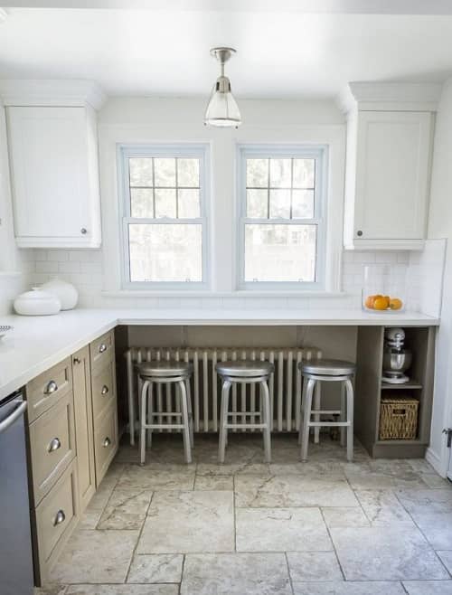Cynthia-Zamaria-Tudor-kitchen-project a kitchen radiator under a counter in a modern kitchen space
