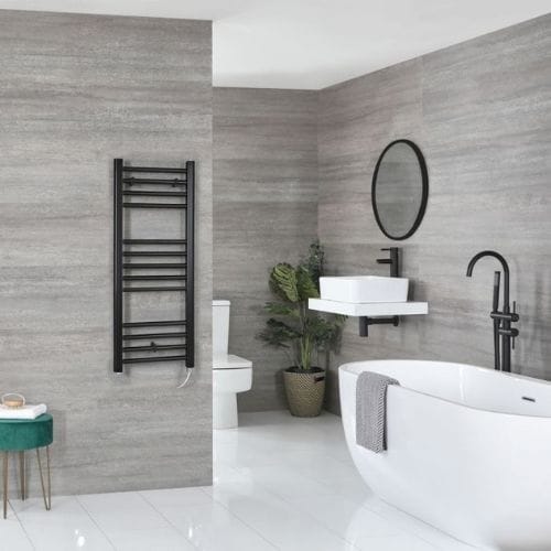 milano nero black electric heated towel rail in a bathroom