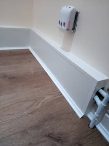 covering radiator pipes along a skirting board