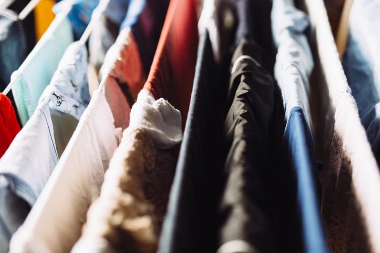 Laundry hung on clothes maiden Colourful laundry hanged to dry