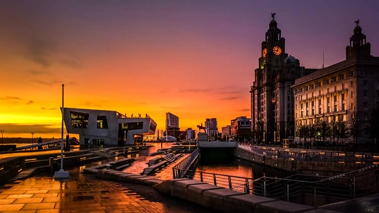 an image of Liverpool docks at sunset