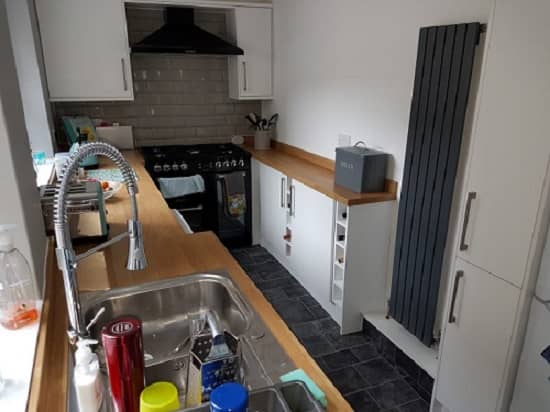 Milano Capri radiator in a kitchen a capri radiator in a galley style kitchen