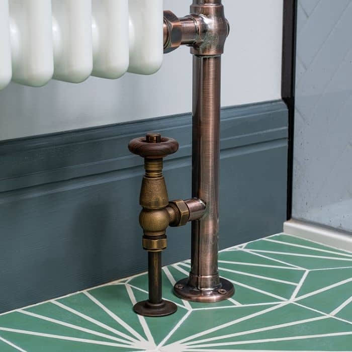 Milano Windsor - Traditional Thermostatic Angled Radiator Valve and Pipe Set Aged Bronze bronze radiator valves on a column towel rail