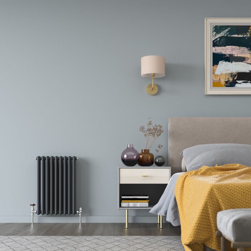 Milano Windsor anthracite small vertical radiator Milano Windsor anthracite vertical radiator in modern bedroom on blue wall