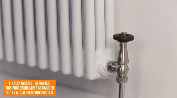 close up of a column radiator and valve