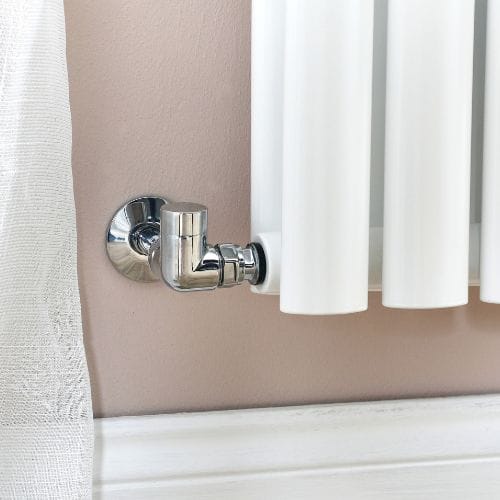 chrome lockshield valve on a white radiator