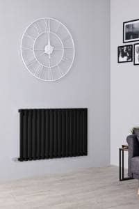 electric milano aruba radiator in a grey living room electric milano aruba radiator in a grey living room