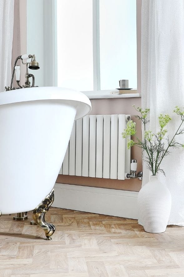 low level aruba radiator in a bathroom