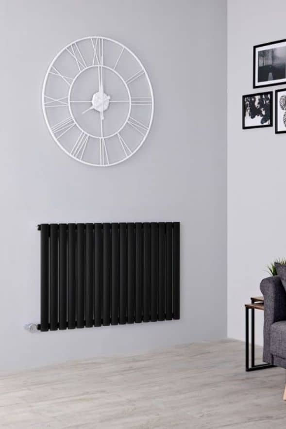 electric milano aruba radiator in a grey living room
