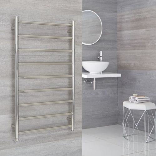 milano esk electric wall mounted heated towel rail on a grey wall