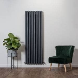 vertical milano aruba radiator next to a chair