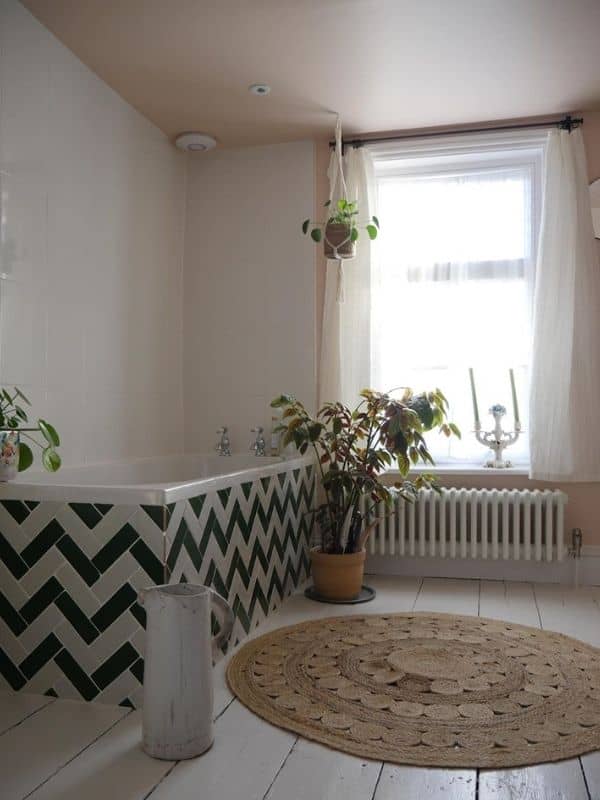 Milano Windsor Low Level low level radiator under a bathroom window