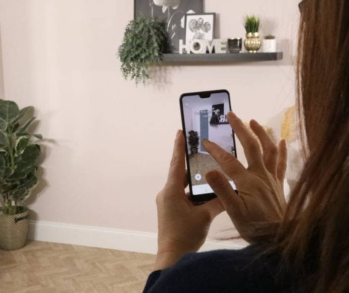 woman using the augmented reality tool