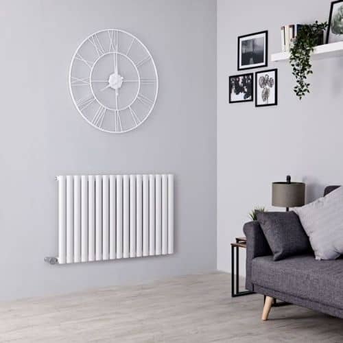milano aruba electric radiator in a grey living room