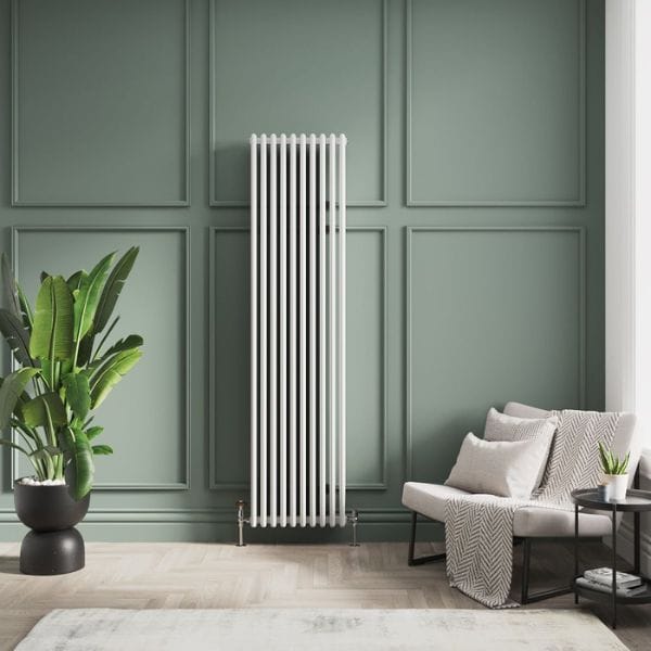 white vertical column radiator in a green living room white vertical column radiator in a green living room