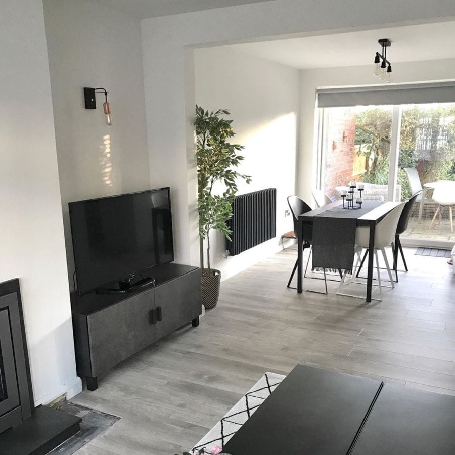 Milano Windsor anthracite radiator in a white living room